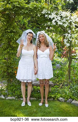 Two brides in garden View Large Photo Image Stock Photograph - Two brides in garden. Fotosearch