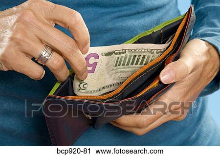 Stock Image - Woman with money. Fotosearch