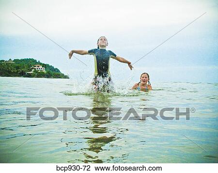 children frolicking in sea in mexico View Large Photo Image Stock Image - children frolicking in sea in mexico. Fotosearch