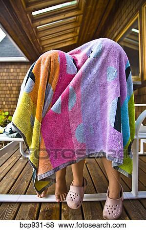 children hiding under beach towels View Large Photo Image Stock Photo - children hiding under beach towels. Fotosearch