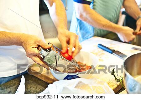 close-up view of hands preparing food View Large Photo Image Stock Image - close-up view of hands preparing food. Fotosearch