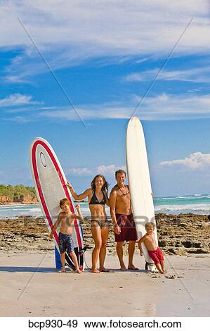 family with surboards on beach in mexico View Large Photo Image Stock Photo - family with surboards on beach in mexico. Fotosearch