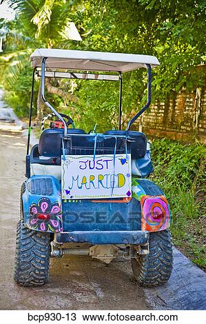 Golf cart with just married sign View Large Photo Image Stock Image - Golf cart with just married sign. Fotosearch