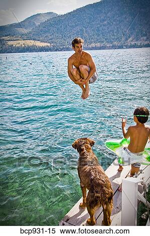 man doing cannonball into lake View Large Photo Image Stock Photography - man doing cannonball into lake. Fotosearch