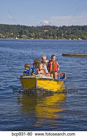 men and young children on motorboat ride View Large Photo Image Stock Image - men and young children on motorboat ride. Fotosearch