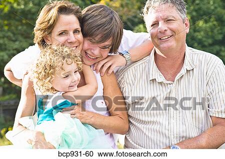 portrait of family of four View Large Photo Image Stock Image - portrait of family of four. Fotosearch