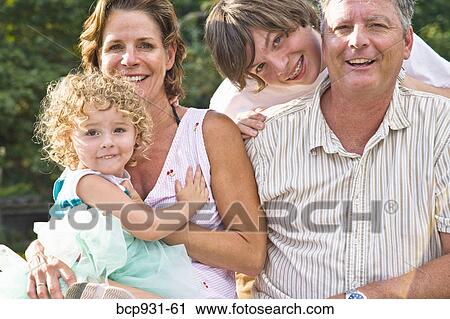 portrait of family of four View Large Photo Image Stock Image - portrait of family of four. Fotosearch