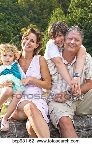 Stock Image - portrait of family of four. Fotosearch