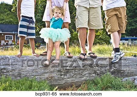 Stock Photography - portrait of family of four. Fotosearch