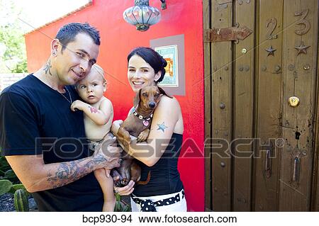 tattoed mom and dad with baby View Large Photo Image Picture - tattoed mom and dad with baby. Fotosearch