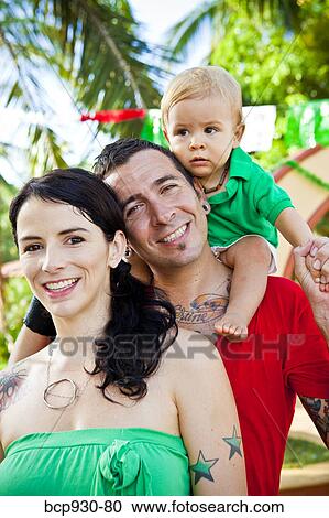 tattoed mom and dad with baby View Large Photo Image Stock Image - tattoed mom and dad with baby. Fotosearch