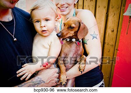 tattoed mom and dad with baby View Large Photo Image Stock Photograph - tattoed mom and dad with baby. Fotosearch