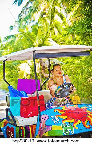 Woman shopping with golf cart in mexico View Large Photo Image Stock Photo - Woman shopping with golf cart in mexico. Fotosearch