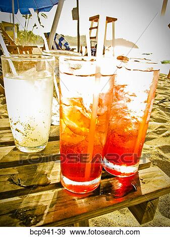 cocktails on beachside table View Large Photo Image Stock Photo - cocktails on beachside table. Fotosearch