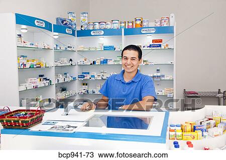 latino pharmacist at counter View Large Photo Image Stock Image - latino pharmacist at counter. Fotosearch