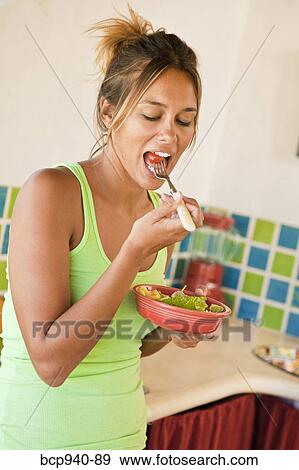 woman eating healthy food View Large Photo Image Stock Photo - woman eating healthy food. Fotosearch