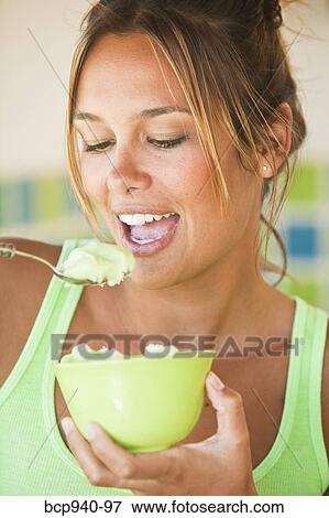woman eating ice cream View Large Photo Image Stock Photo - woman eating ice cream. Fotosearch