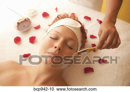 woman getting a facial treatment View Large Photo Image Stock Image - woman getting a facial treatment. Fotosearch