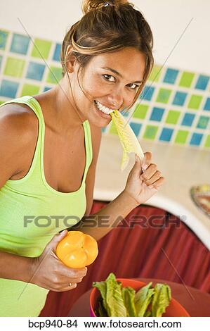 woman preparing food in kitchen View Large Photo Image Picture - woman preparing food in kitchen. Fotosearch