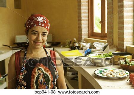 woman preparing food in kitchen View Large Photo Image Stock Photo - woman preparing food in kitchen. Fotosearch