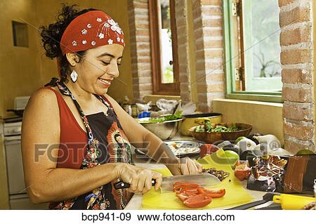 woman preparing food in kitchen View Large Photo Image Stock Photo - woman preparing food in kitchen. Fotosearch