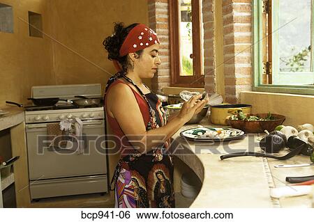 woman preparing food in kitchen View Large Photo Image Stock Photograph - woman preparing food in kitchen. Fotosearch