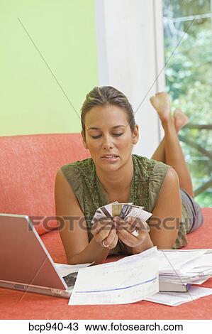 Stock Image - woman shopping online. Fotosearch