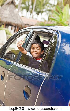 young mexican boy in car View Large Photo Image Stock Image - young mexican boy in car. Fotosearch