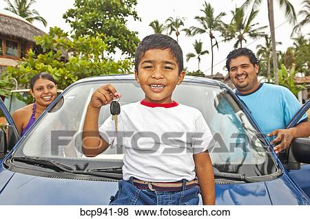 young mexican family with car View Large Photo Image Stock Photo - young mexican family with car. Fotosearch