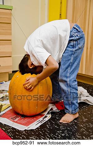 boy carving jack o'lantern View Large Photo Image Stock Image - boy carving jack o'lantern. Fotosearch