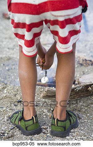 boy roasting marshmallow over fire View Large Photo Image Stock Photography - boy roasting marshmallow over fire. Fotosearch