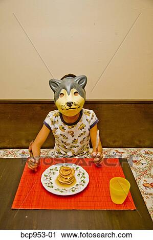 boy wearing dog mask at table View Large Photo Image Stock Image - boy wearing dog mask at table. Fotosearch