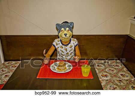 boy wearing dog mask at table View Large Photo Image Stock Photo - boy wearing dog mask at table. Fotosearch