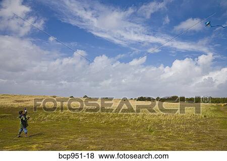 Stock Photo - boy with kite. Fotosearch