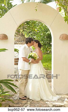 bridal couple kissing outdoors View Large Photo Image Stock Photo - bridal couple kissing outdoors. Fotosearch