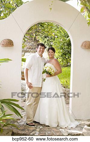 bridal couple posing outdoors View Large Photo Image Stock Image - bridal couple posing outdoors. Fotosearch