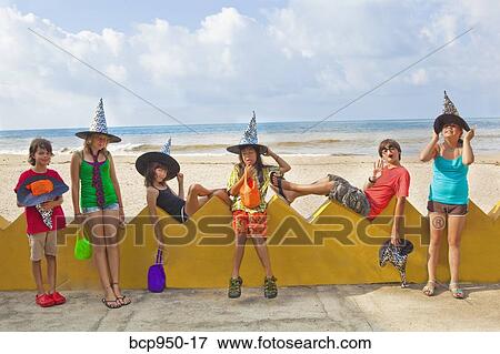 children at beach in witch hats View Large Photo Image Stock Photo - children at beach in witch hats. Fotosearch