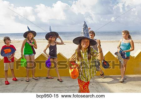 children at beach in witch hats View Large Photo Image Stock Photography - children at beach in witch hats. Fotosearch
