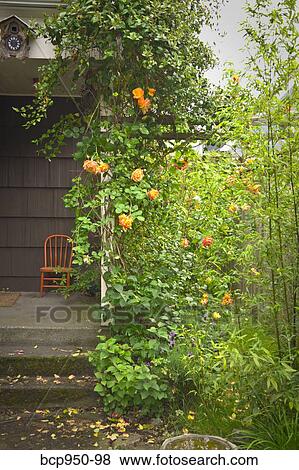 front porch and garden of brown house View Large Photo Image Stock Photo - front porch and garden of brown house. Fotosearch
