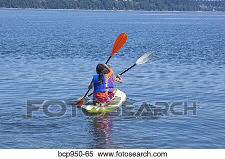 girls on paddle board in lake View Large Photo Image Stock Photography - girls on paddle board in lake. Fotosearch
