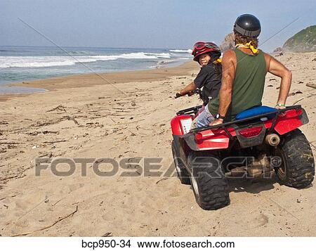 man and girl riding dune buggy View Large Photo Image Picture - man and girl riding dune buggy. Fotosearch