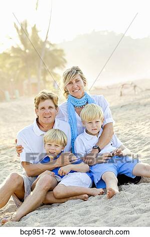 portrait of family on beach View Large Photo Image Stock Image - portrait of family on beach. Fotosearch