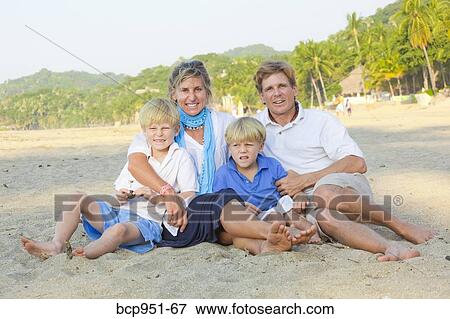 portrait of family on beach View Large Photo Image Stock Photo - portrait of family on beach. Fotosearch