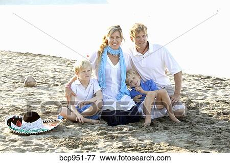 portrait of family on beach View Large Photo Image Stock Photo - portrait of family on beach. Fotosearch