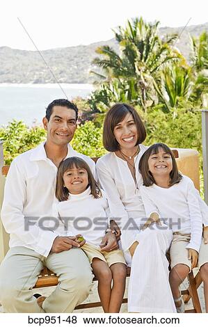portrait of parents with two daughters View Large Photo Image Stock Photo - portrait of parents with two daughters. Fotosearch