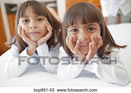 portrait of two smiling young girls View Large Photo Image Stock Image - portrait of two smiling young girls. Fotosearch