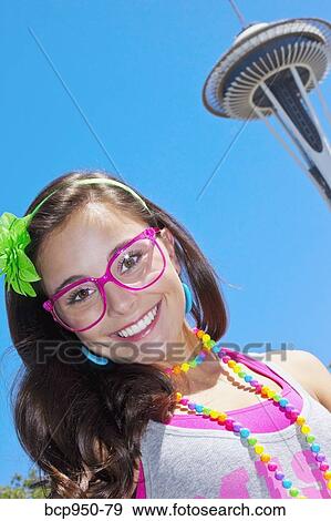 teen girl in front of space needle View Large Photo Image Stock Photo - teen girl in front of space needle. Fotosearch
