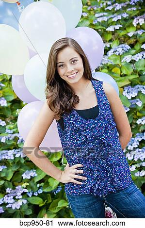 teen girl with bunch of balloons View Large Photo Image Stock Image - teen girl with bunch of balloons. Fotosearch
