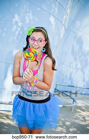 teen girl with large lollipop View Large Photo Image Stock Image - teen girl with large lollipop. Fotosearch
