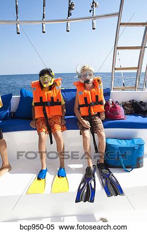 two children preparing to snorkle View Large Photo Image Stock Photography - two children preparing to snorkle. Fotosearch